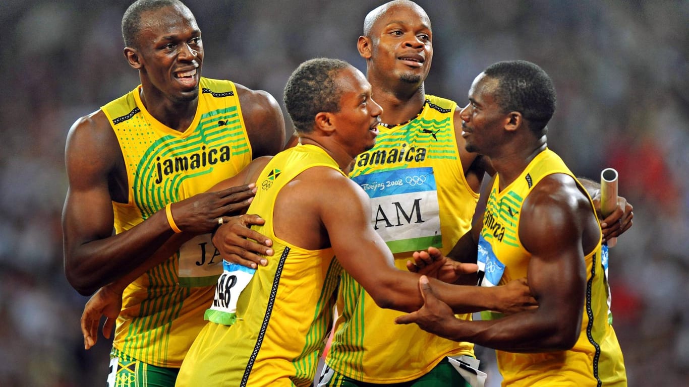 Usain Bolt, Michael Frater, Asafa Powell, Nesta Carter (li.) gewannen Gold in Peking - diese Medaille wird ihnen nun weggenommen.