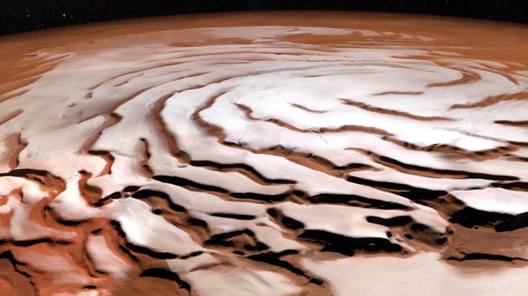 Dieses Bild vom Mars zeigt eine riesige, eisige Spirale am Nordpol des Planeten. Das Motiv wurde aus Aufnahmen der Esa-Sonde Mars Express zusammengesetzt.