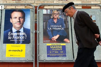 Die Franzosen müssen sich zwischen der Rechtspopulistin Marine Le Pen und dem jungen Senkrechtstarter Emmanuel Macron entscheiden.