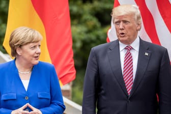 Bundeskanzlerin Angela Merkelund US-Präsident Donald Trump beim G7-Gipfel in Taormina.