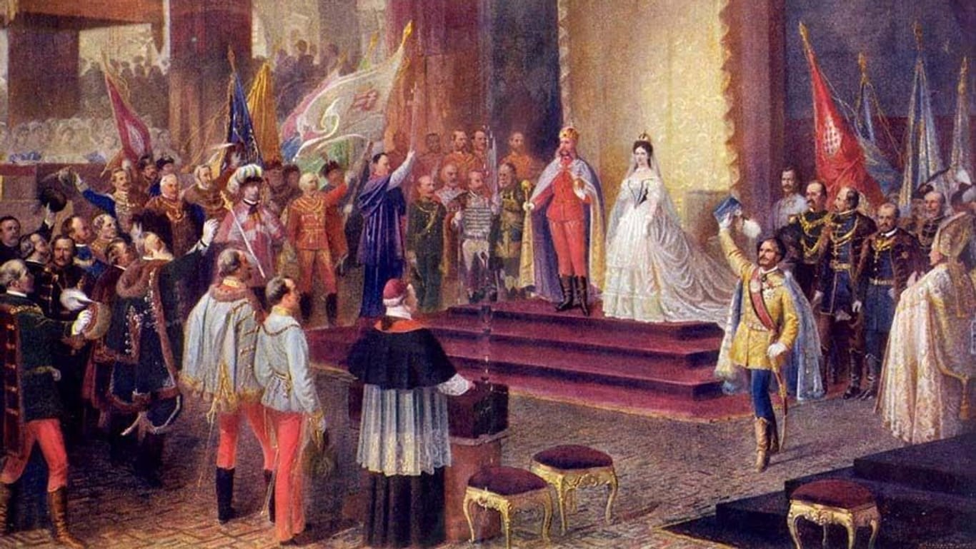 Der Maler Edmund Tull hielt die Krönung von Kaiser Franz Joseph I. und seiner Gemahlin Elisabeth, genannt Sisi, zum Königspaar von Ungarn in einem Gemälde fest.