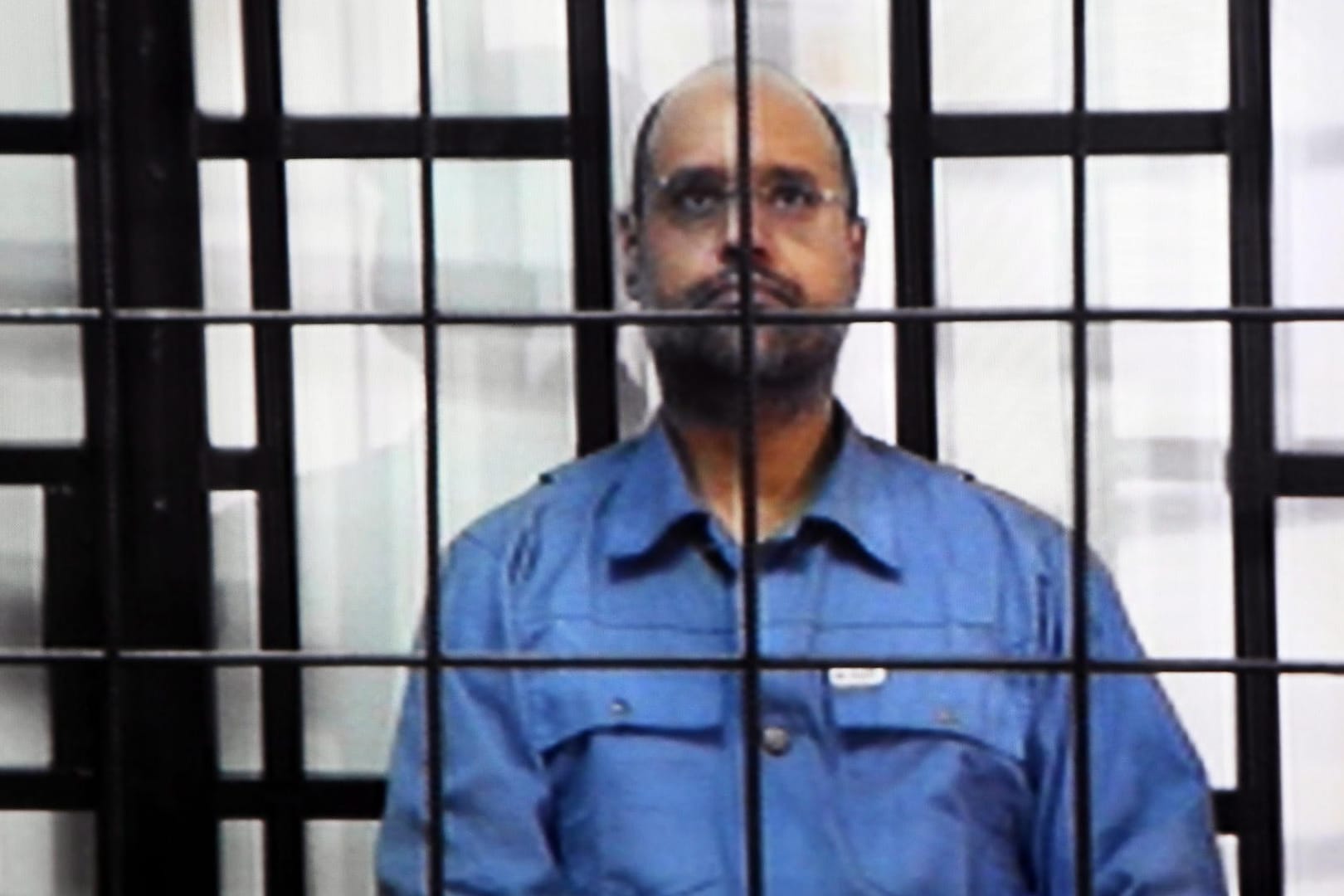 Saif al-Islam, der Sohn des früheren libyschen Machthabers Muammar Gaddafi, bei seiner Gerichtsverhandlung 2011. (Archiv)