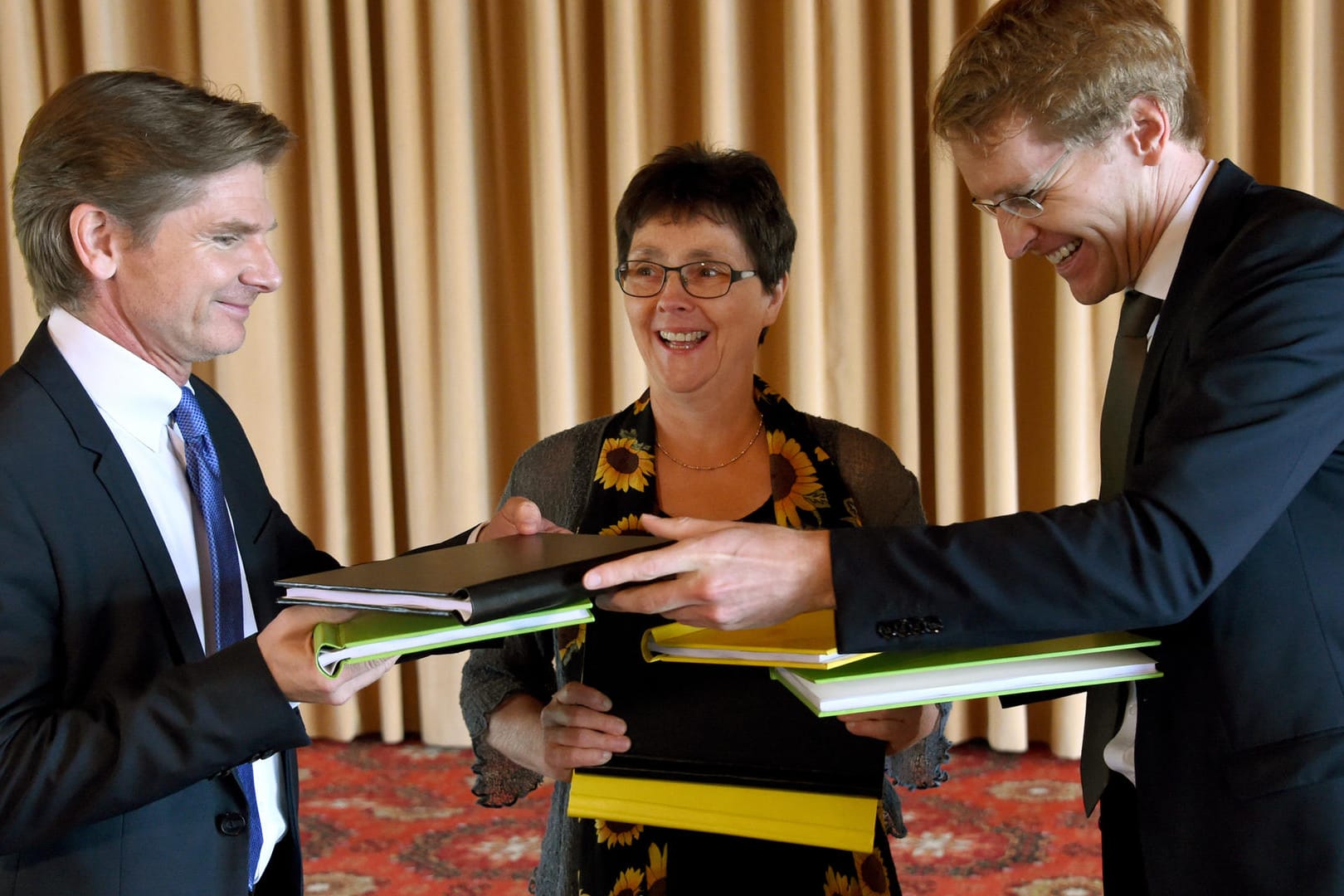 Die Verhandlungsführer der schleswig-holsteinischen Koalitionsverhandlungen, (l-r) Heiner Garg (FDP), Monika Heinold (Bündnis 90/Die Grünen) und Daniel Günther (CDU).