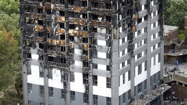 Der ausgebrannte Grenfell Tower in London. Der ausgebrannte Grenfell Tower in London.