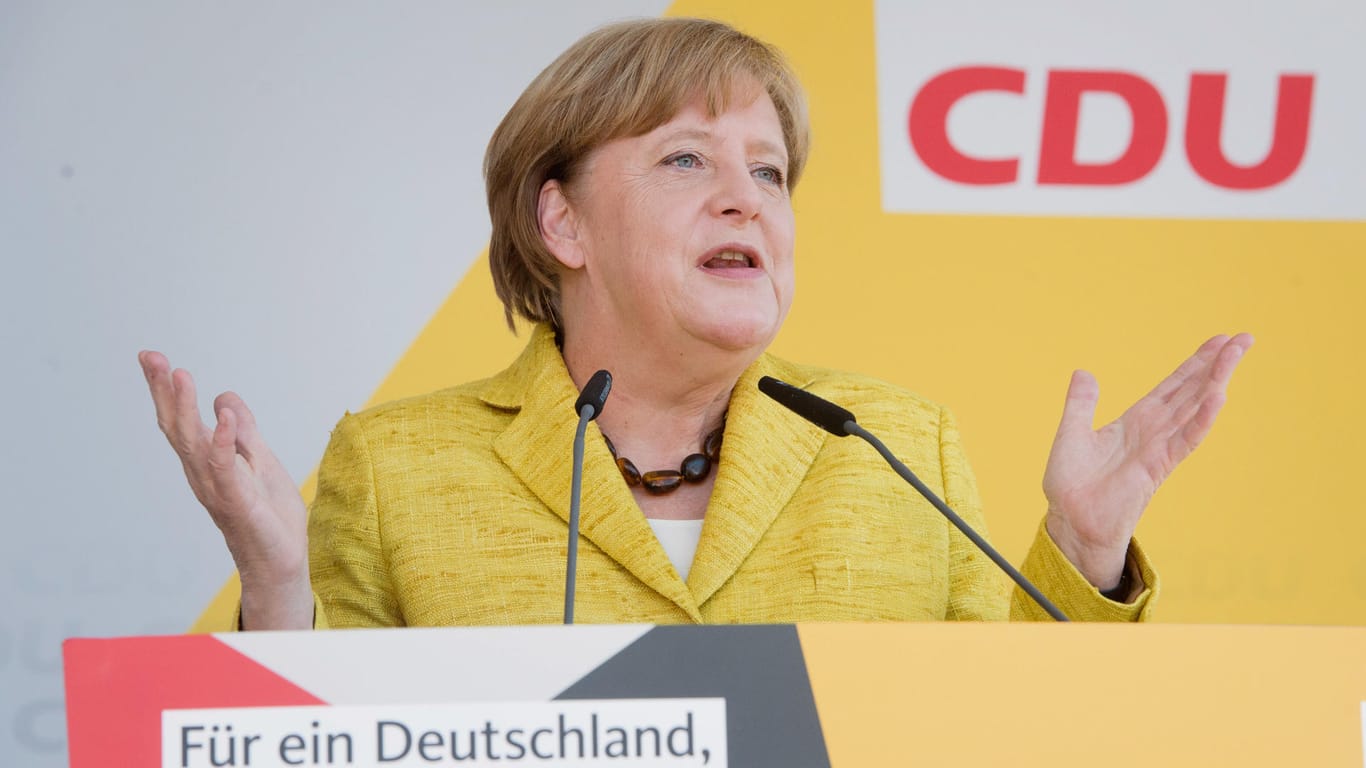 Bundeskanzlerin Angela Merkel (CDU) symbolisch in Gelb. Wenn am Sonntag Bundestagswahl wäre, könnte die Kanzlerin gemeinsam mit der FDP auf eine Regierungsmehrheit hoffen.
