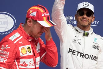 Lewis Hamilton (rechts) zeigte Sebastian Vettel (links) beim Ferrari-Heimspiel in Monza die Grenzen auf.