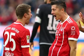 Die Matchwinner: Thomas Müller (l.) und Robert Lewandowski feiern das 3:0 gegen Mainz.