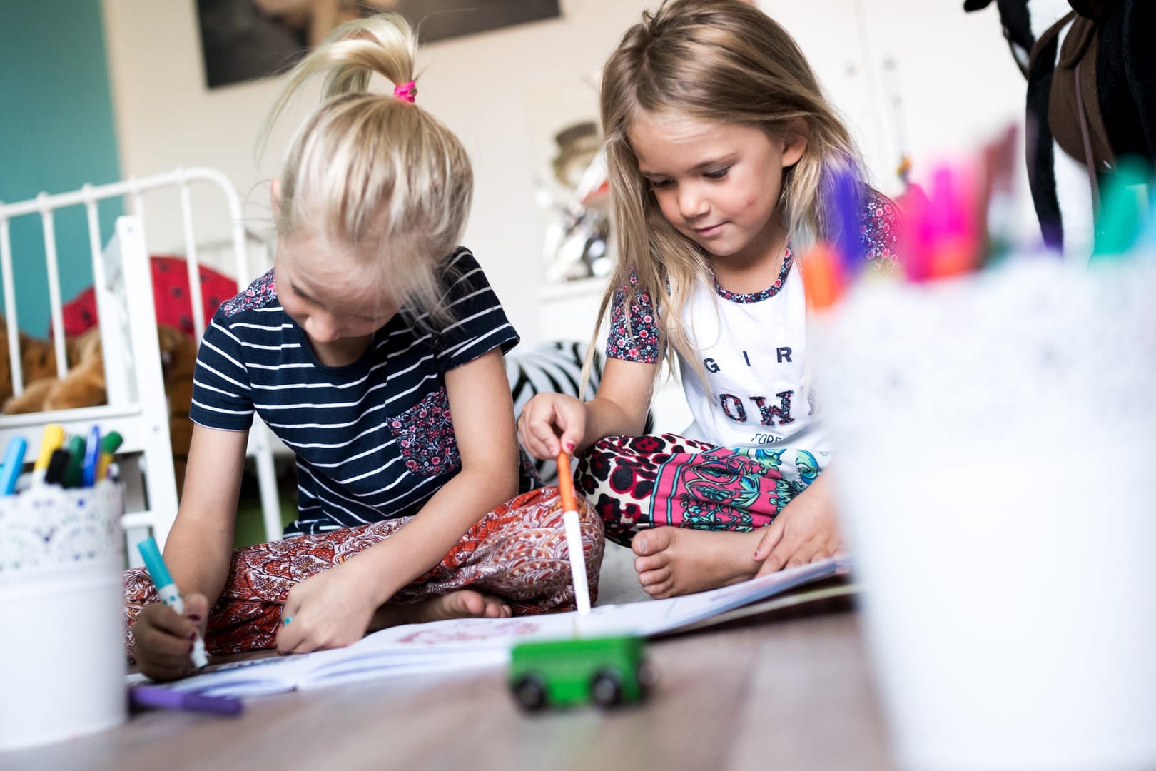 Wenn die Jüngsten sich ein Kinderzimmer teilen, ist immer jemand zum Spielen da.