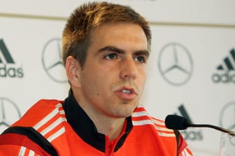 Philipp Lahm, hier bei einer Pressekonferenz vor dem Länderspiel gegen Chile am 4. März 2014, könnte in anderer Funktion zum DFB zurückkehren.