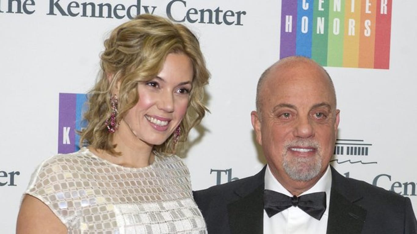 Der US-Musiker Billy Joel und seine Frau Alexis Roderick (2013).