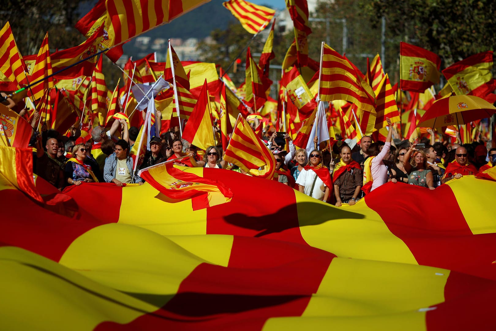Pro-unity supporters take part in a demonstration in central Barcelona