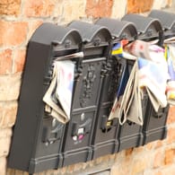 Mailboxes full of advertising magazines