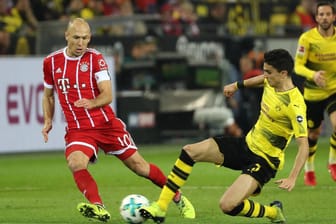 Bald bei der Klub-WM gegeneinander? Bayerns Robben (li.) gegen Dortmunds Bartra.