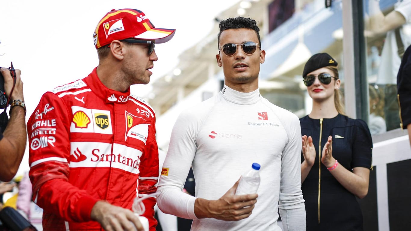 Künftig keine Konkurrenten mehr: Ferrari-Pilot Sebastian Vettel (l.) und Pascal Wehrlein, der sein Cockpit bei Sauber verliert.