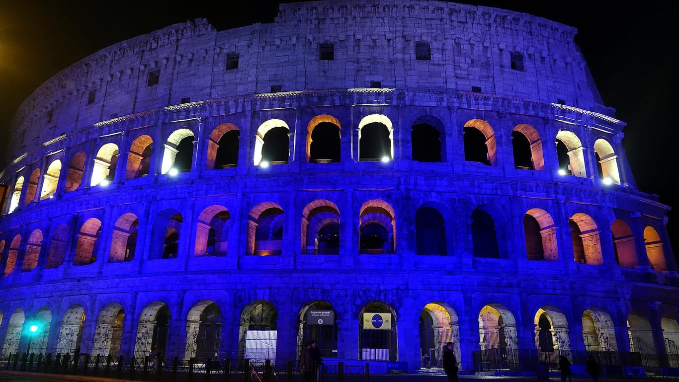 The Colosseum is lit up in Finland's blue and white colours to celebrate Finland's 100 years of independence anniversary, in Rome, Italy