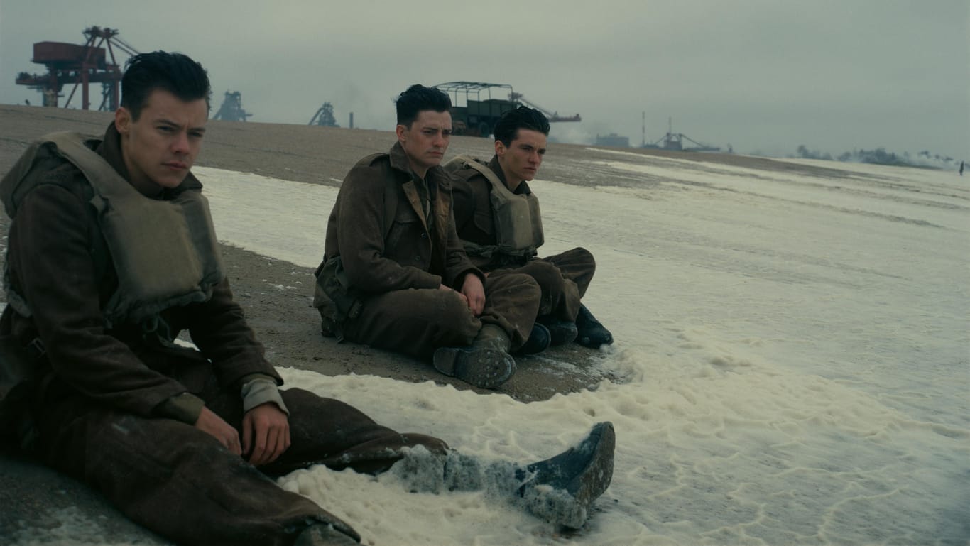 Im Film "Dunkirk" spielen Harry Styles, Aneurin Barnard und Fionn Whitehead Soldaten.