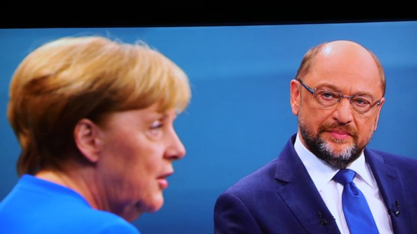CDU-Chefin Angela Merkel und der SPD-Vorsitzende Martin Schulz.