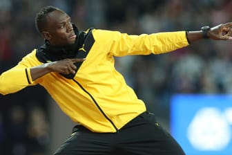 Usain Bolt in schwarz-gelb bei der Leichtathletik-WM: Im März wird der Jamaikaner das Trainingsdress von Borussia Dortmund tragen.