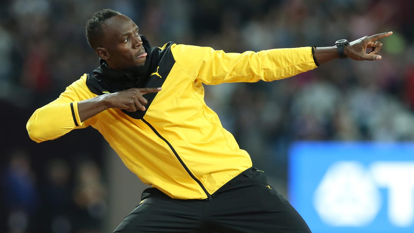 Usain Bolt in schwarz-gelb bei der Leichtathletik-WM: Im März wird der Jamaikaner das Trainingsdress von Borussia Dortmund tragen.