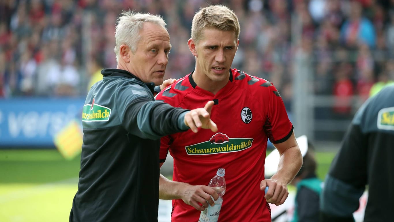 Freiburgs Nils Petersen (r.) mit Christian Streich: Der Spieler hat nur lobende Worte für seinen Trainer übrig.