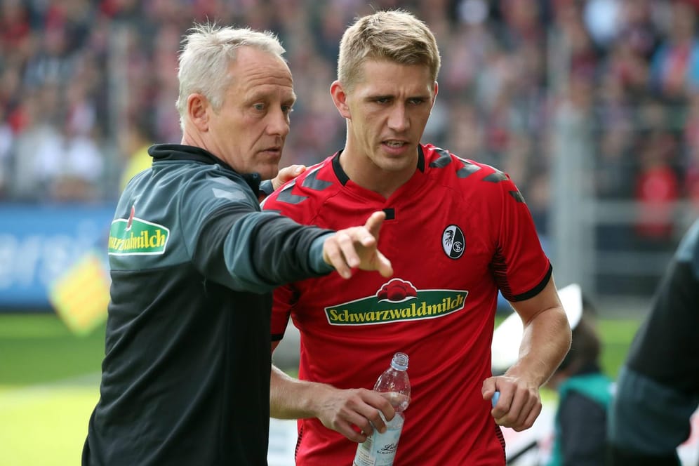 Freiburgs Nils Petersen (r.) mit Christian Streich: Der Spieler hat nur lobende Worte für seinen Trainer übrig.