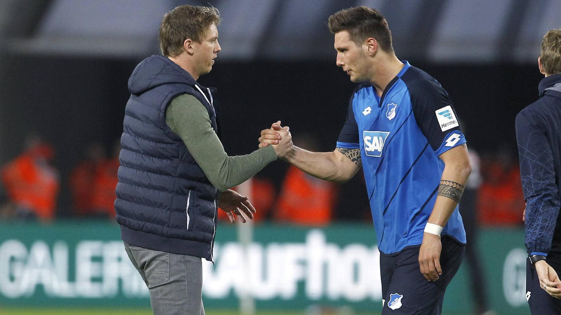 Julian Nagelsmann (l.) mit Niklas Süle: Gemeinsam erreichten sie mit Hoffenheim die Champions-League-Qualifikation.