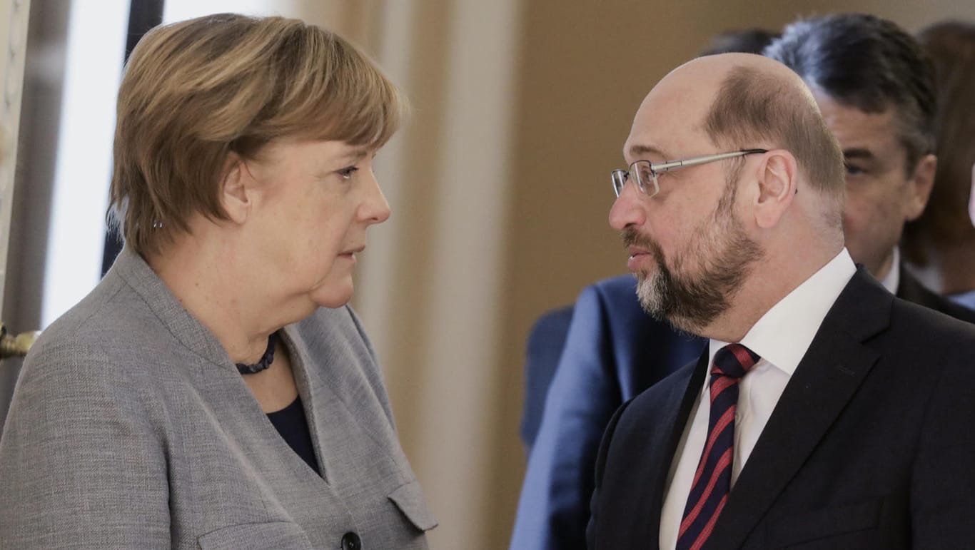 Angela Merkel und Martin Schulz: Der SPD-Chef will in den Koalitionsverhandlungen einige Nachbesserungen des Sondierungspapiers.