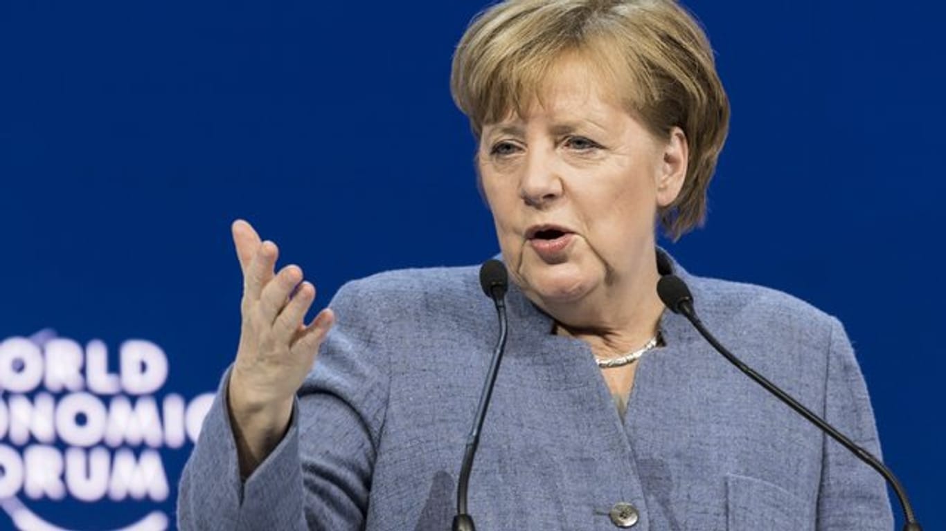 "Deutschland will ein Land sein, das auch in Zukunft seinen Beitrag leistet, um gemeinsam in der Welt die Probleme der Zukunft zu lösen", sagte Kanzlerin Merkel beim Weltwirtschaftsforum.