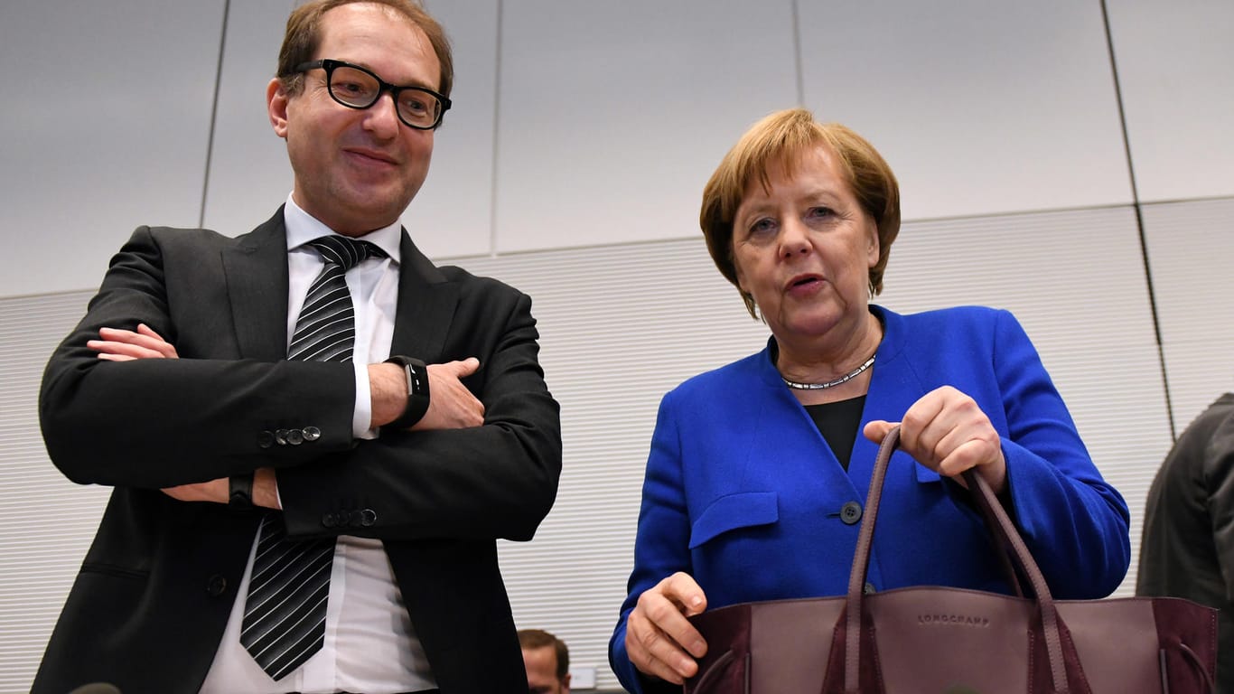 Angela Merkel und CSU-Landesgruppenchef Alexander Dobrindt: Die Union zeigt sich mit dem Kompromiss beim Familiennachzug zufrieden.