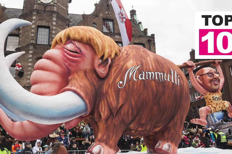 Motivwagen im Karneval 2017: Beim Düsseldorfer Rosenmontagszug sind die Wagen oft besonders bissig und frech. Im vergangenen Jahr wurden Angela Merkel und Martin Schulz als Mammut und Steinzeitmensch karikiert.