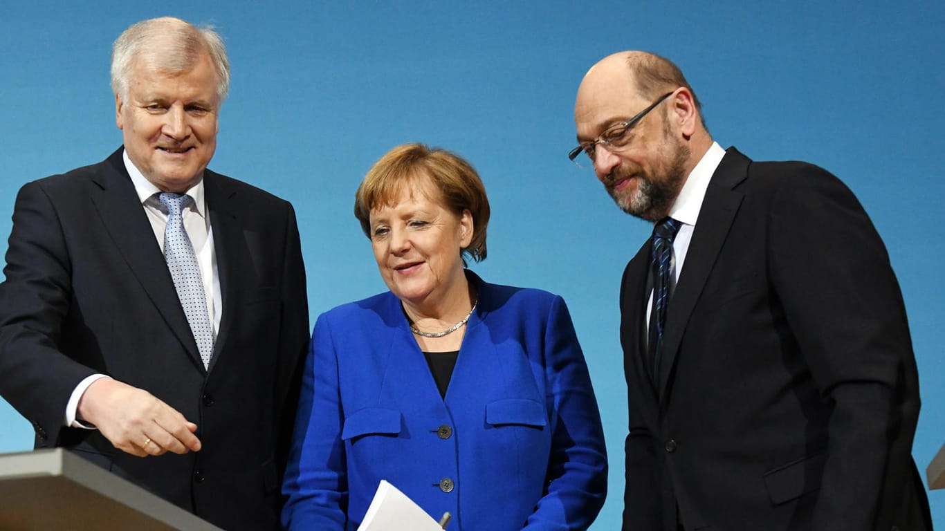 Horst Seehofer, Martin Schulz und Angela Merkel: Die Parteispitzen sollen sich auf einen Koalitionsvertrag geeinigt haben.