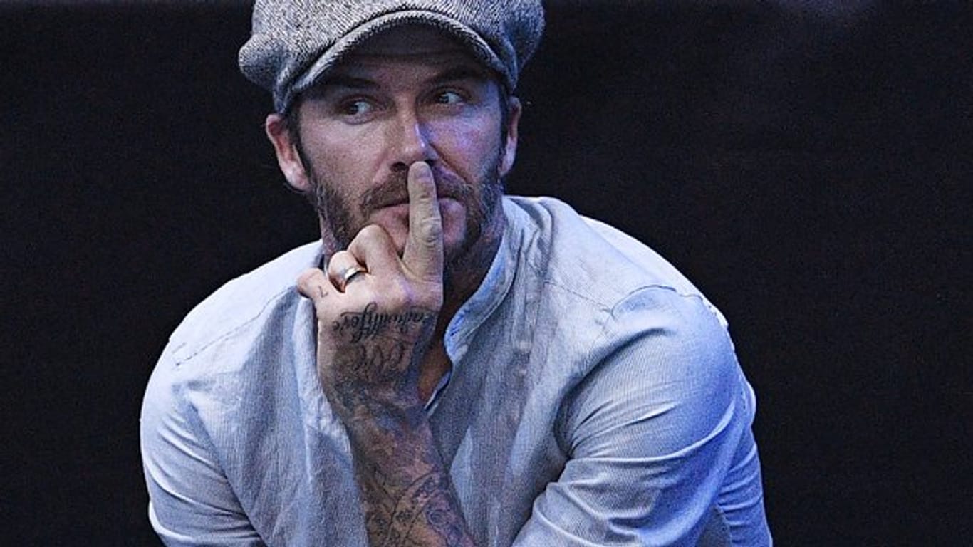 David Beckham hat Freude an seinen Tattoos.