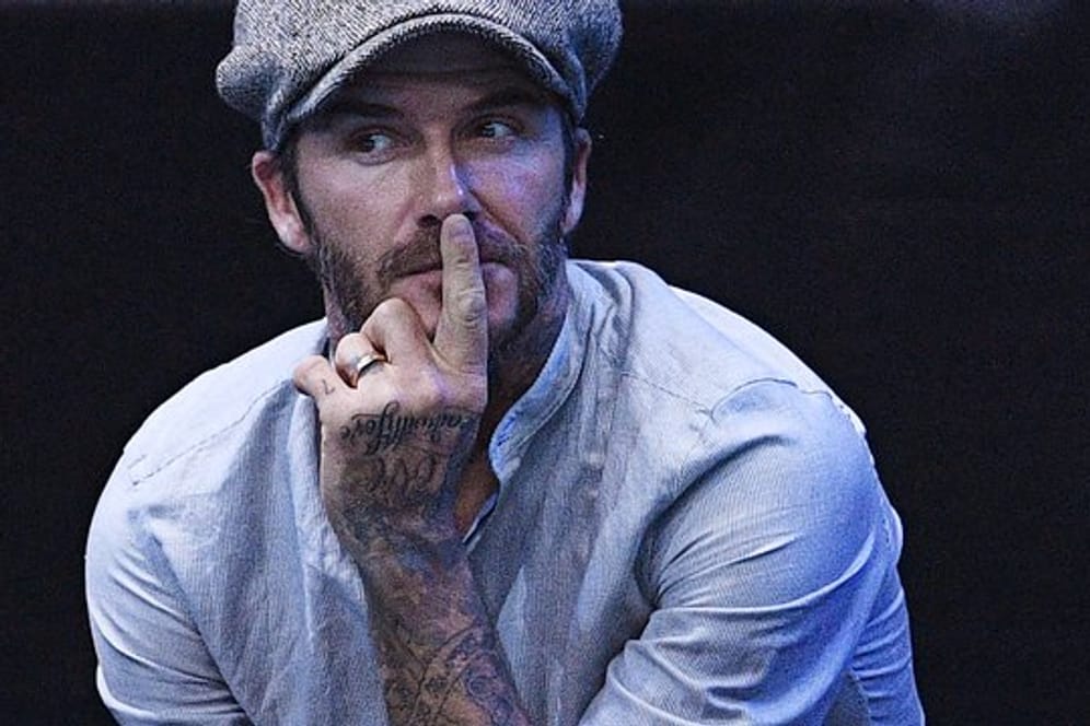 David Beckham hat Freude an seinen Tattoos.