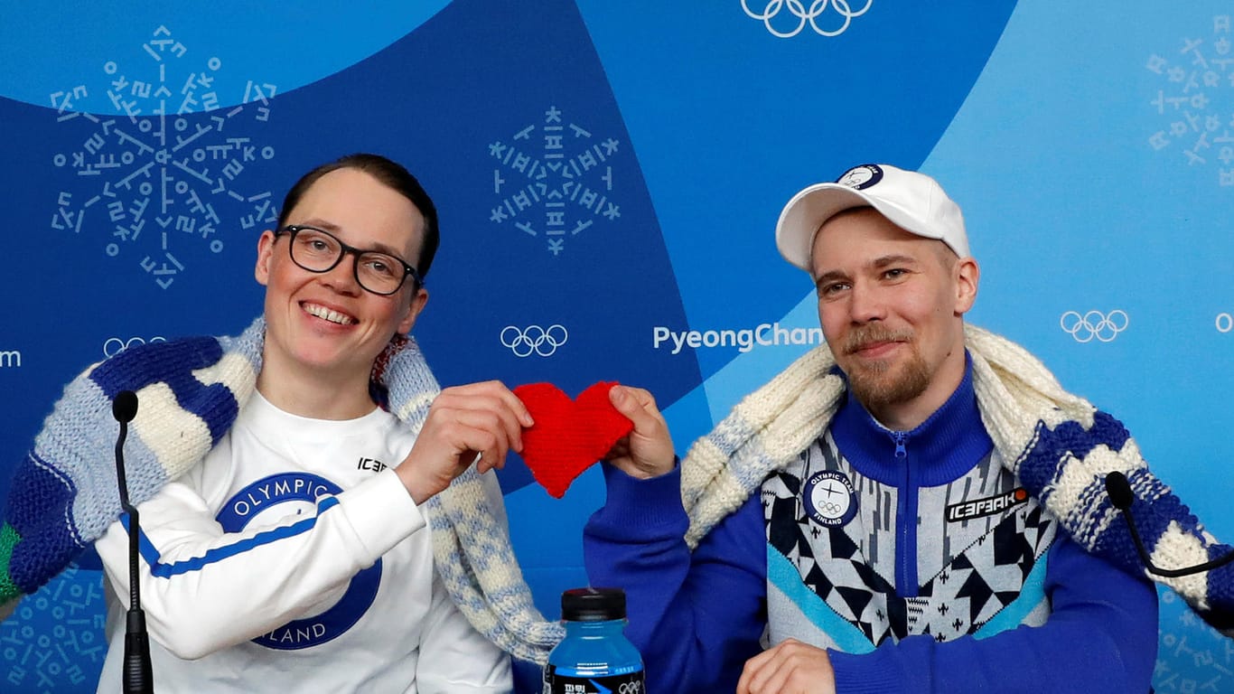 Antti Koskinen, snowboard head coach and snowboarder Roope Tonteri attend a news conference regarding the knitting project in Pyeongchang