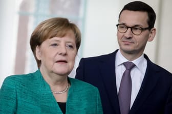 Bundeskanzlerin Merkel und der polnische Ministerpräsident Morawiecki: Die Regierungschefs bemühen sich um eine Emtkrampfung des Verhältnisses zwischen Polen und Deutschland.