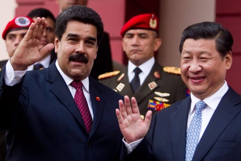 Amnesty prangerte konkret die Staatschefs von Venezuela und China, Nicolas Maduro (l) und Xi Jinping an, aber auch Wladimir Putin und Donald Trump.