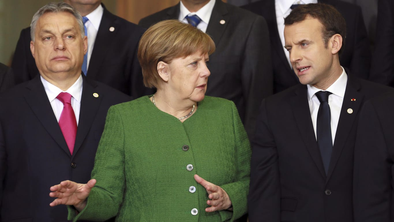 Viktor Orban, Angela Merkel und Emmanuel Macron beim EU-Gipfel: Die Staatschefs haben sich darauf geeinigt, mehr Geld für Verteidigung und Sicherheit auszugeben.