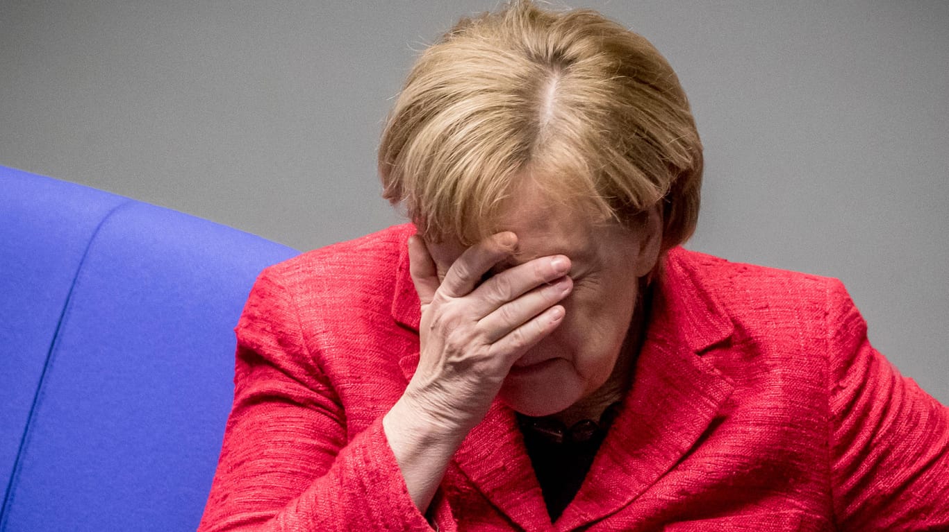 Merkel, Hand vorm Gesicht: Seht ihr mich? Und wenn ja, was seht ihr?