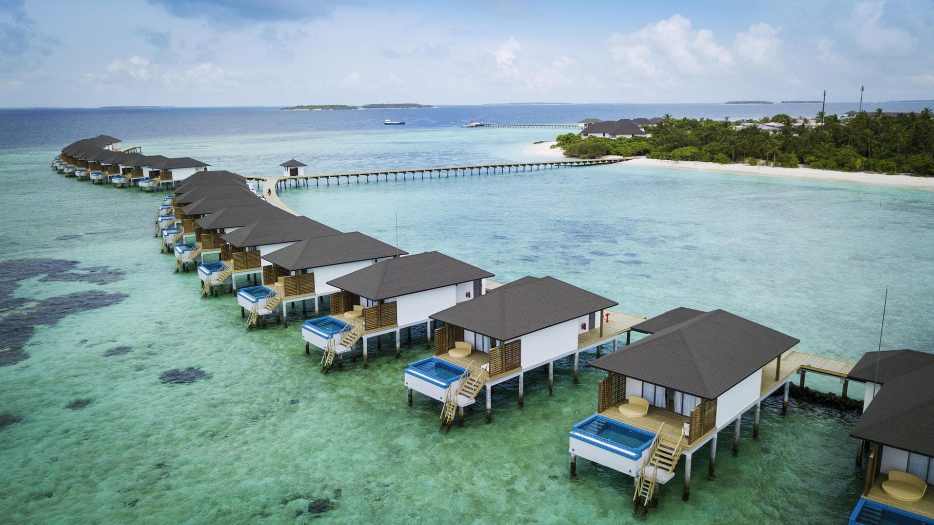 Wasserbungalows im Robinson Club Noonu, Malediven.