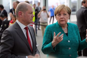 Olaf Scholz und Angela Merkel: Bilden sie das Vize- und Kanzler-Gespann der neuen Regierung?