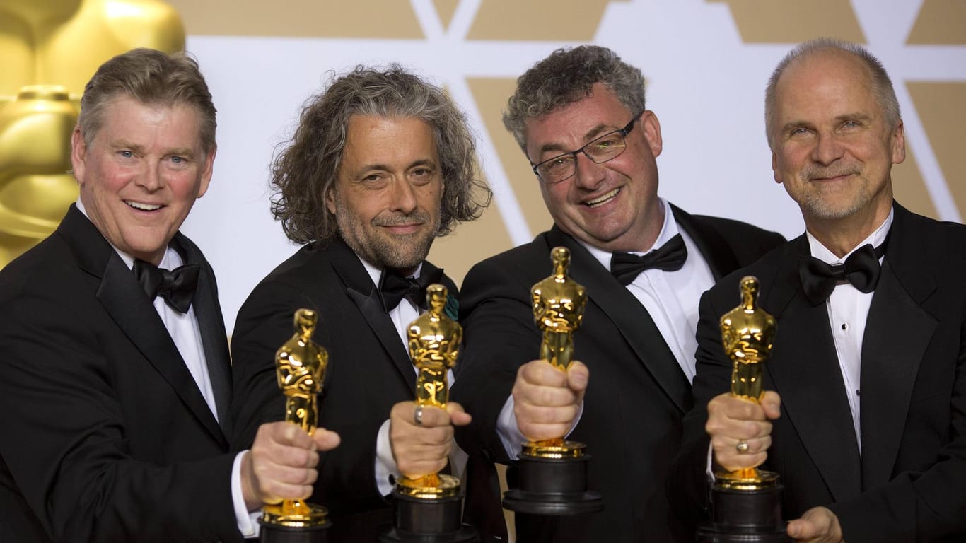 Richard R. Hoover, Paul Lambert, Gerd Nefzer und John Nelson (v.l.): Sie gewannen den Oscar für die besten visuellen Effekte.