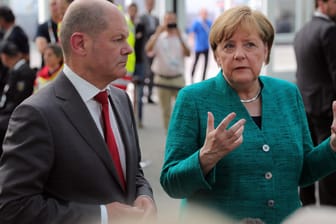 Angela Merkel und Olaf Scholz: im Sommer 2017 beim G20-Gipfel. Nun stehen sie zusammen an der Spitze der Bundesregierung.
