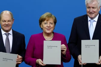 CDU, CSU and SPD present signed coalition deal during a ceremony in Berlin