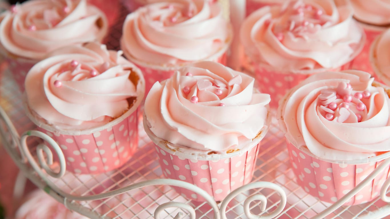 Pink cupcakes on shelf for wedding or valentine