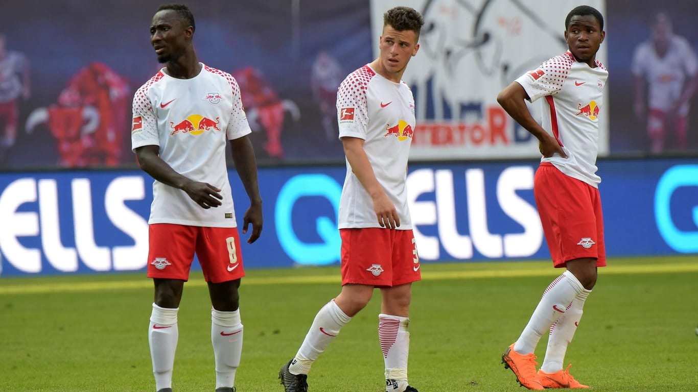 Fassungslos: Die Leipziger (v. l.) Naby Keita, Diego Demme und Ademola Lookman während der Pleite gegen Hoffenheim.
