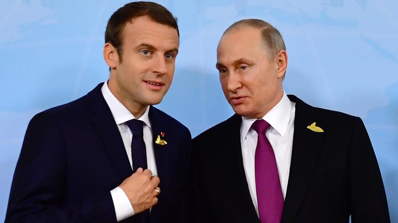 Emmanuel Macron mit Wladimir Putin beim G20-Gipfel: Vor seinem US-Besuch ruft Macron zu Stärke gegenüber Russland auf.