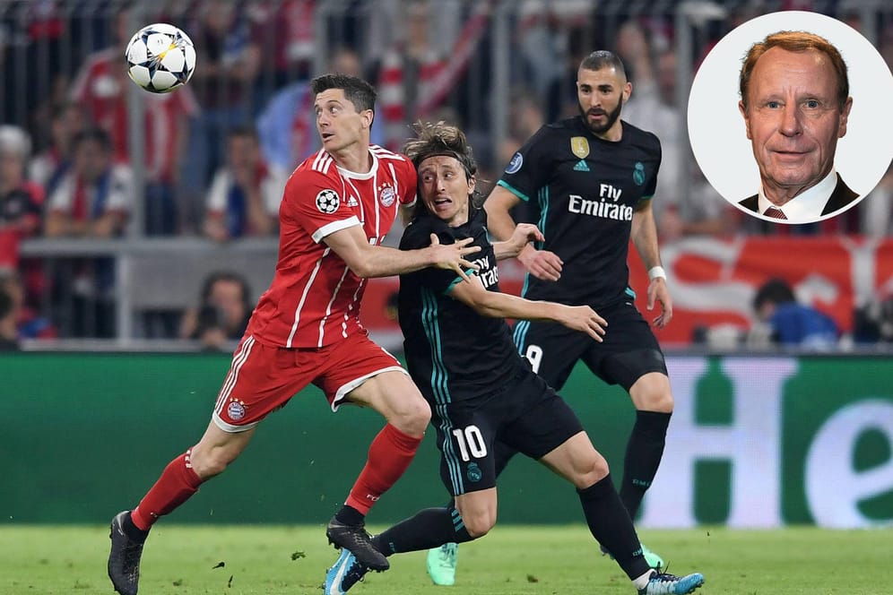 Robert Lewandowski im Duell mit Reals Luka Modric. Berti Vogts findet die derzeitige Kritik am Bayern-Stürmer zu hart, trotzdem müsse Lewandowski etwas zurückzahlen.