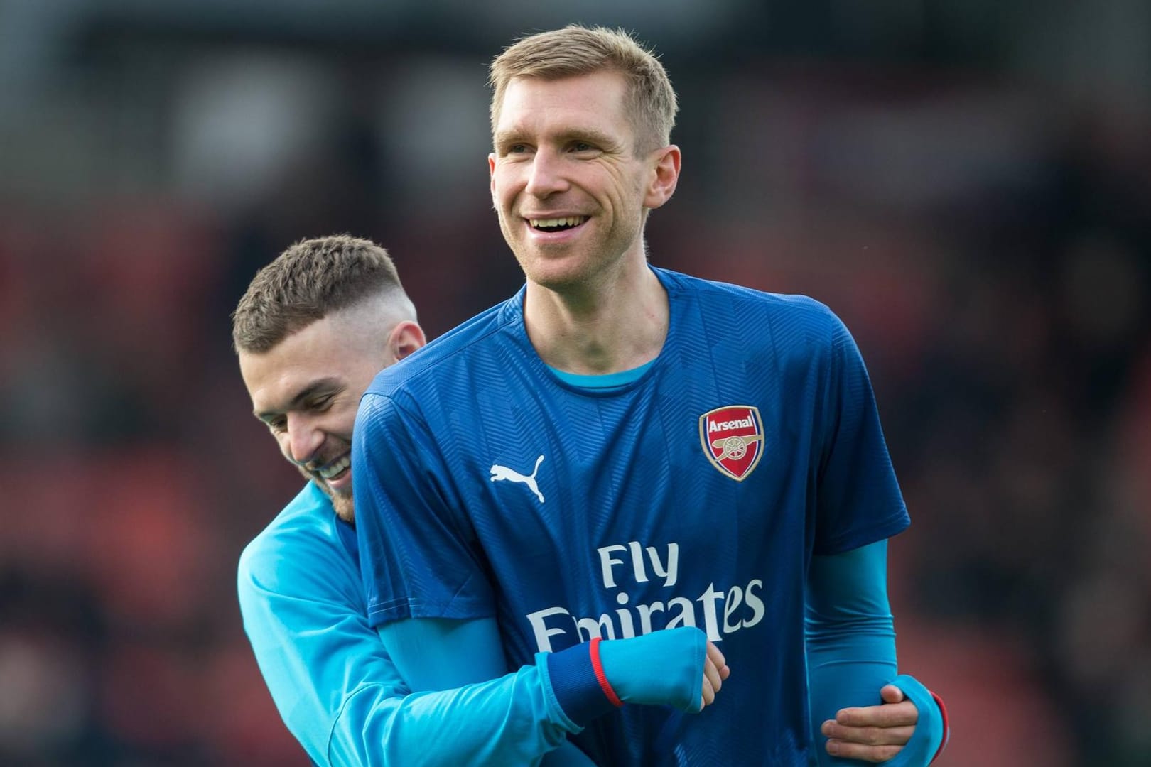 Mertesacker mit Teamkollege Ramsey: "Ich verlange von niemandem, dass er mich versteht."