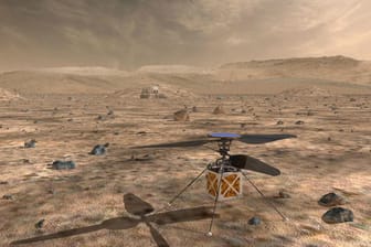 Eine Computergrafik der Nasa zeigt einen Hubschrauber auf dem Mars: Ein Mini-Helikopter soll für die Raumfahrt-Behörde Aufnahmen vom roten Planeten machen.