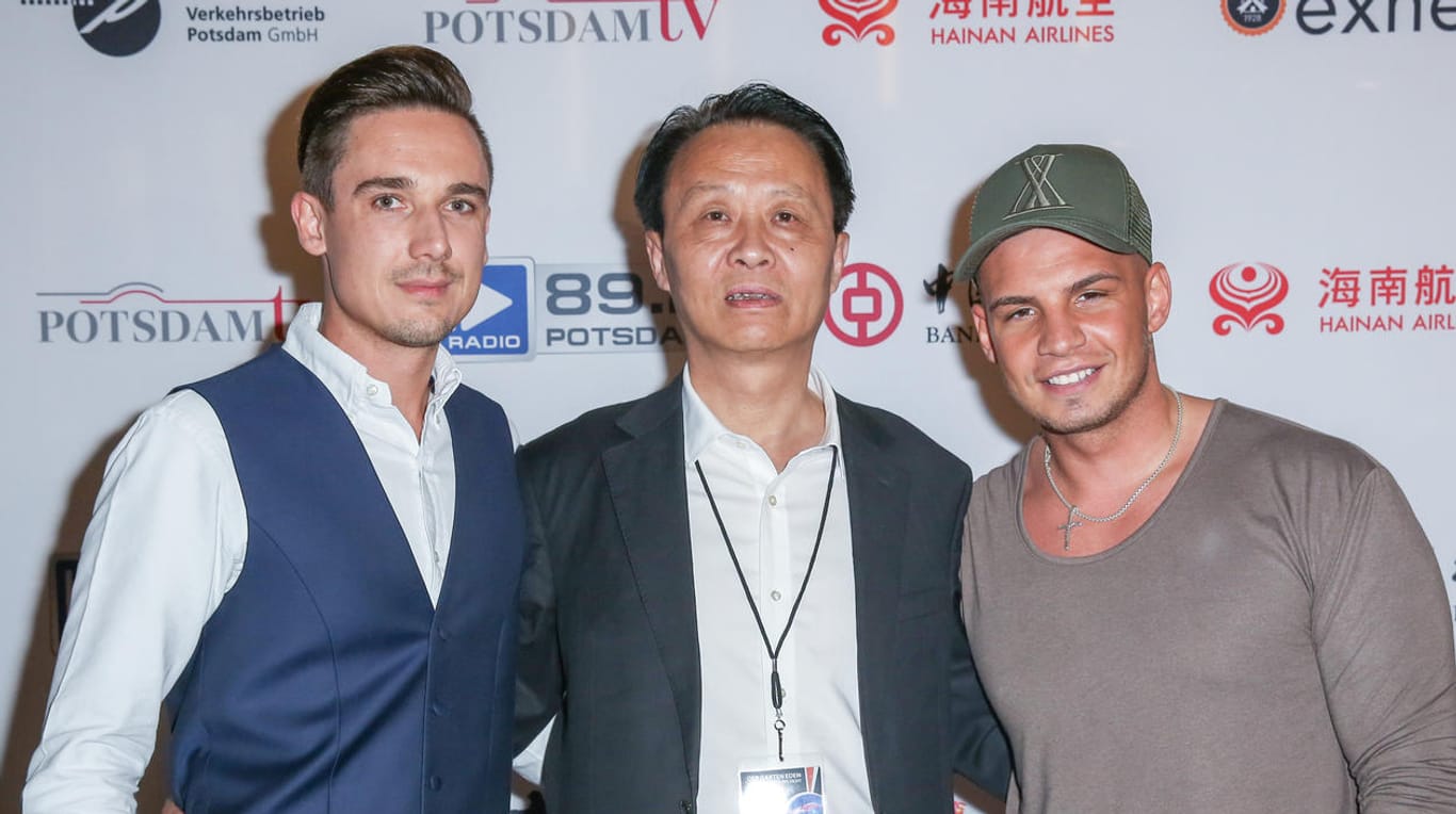 Die Organisatoren: Pietro Lombardi mit Eventleiter Sebastian Bruns und Direktor Zhou Wangdong.